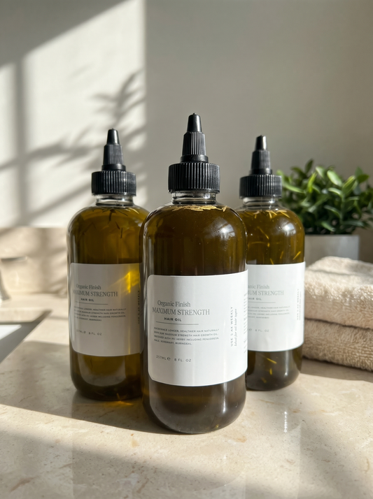Maximum Strength Hair Oil 6-month supply, three 8oz bottles by Organic Finish, styled photo 1