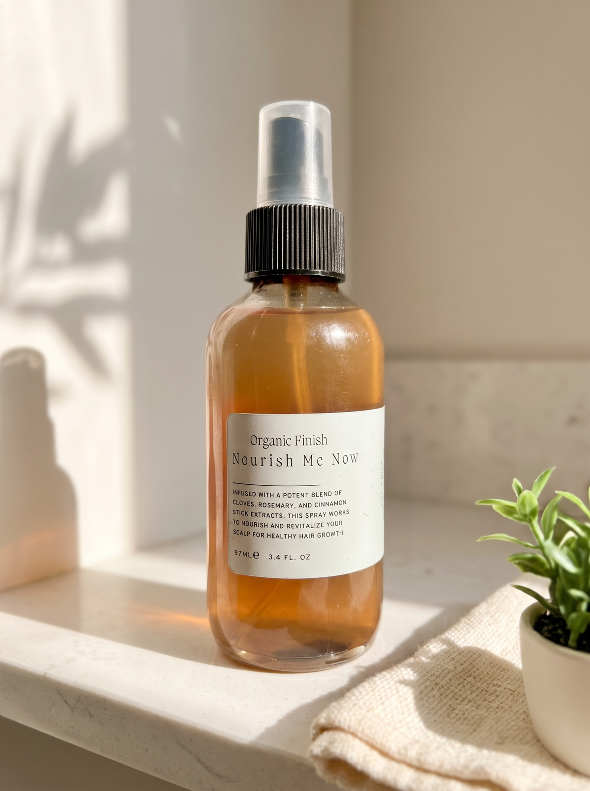 Nourish Me Now Hair Spray with rosemary, clove and cinnamon by Organic Finish, styled photo 3